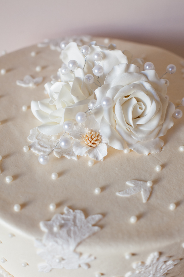 Baked Expressions, floral topper, beads, white floweres, Kansas City weddings, Jana Marie